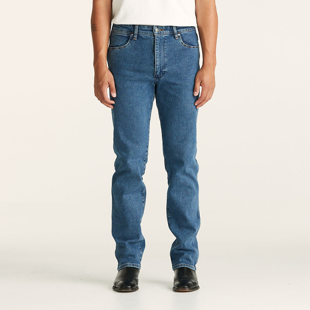 Stewarts Menswear Wrangler Classics Straight Jeans. Colour is Original Stone. Photo shows model wearing wrangler jeans front view.