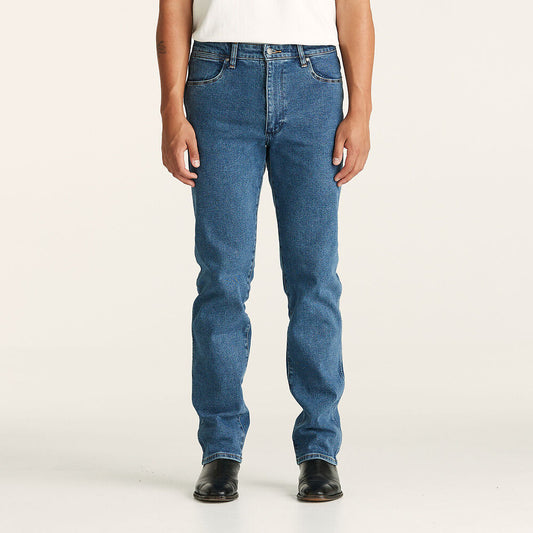 Stewarts Menswear Wrangler Classics Straight Jeans. Colour is Original Stone. Photo shows model wearing wrangler jeans front view.