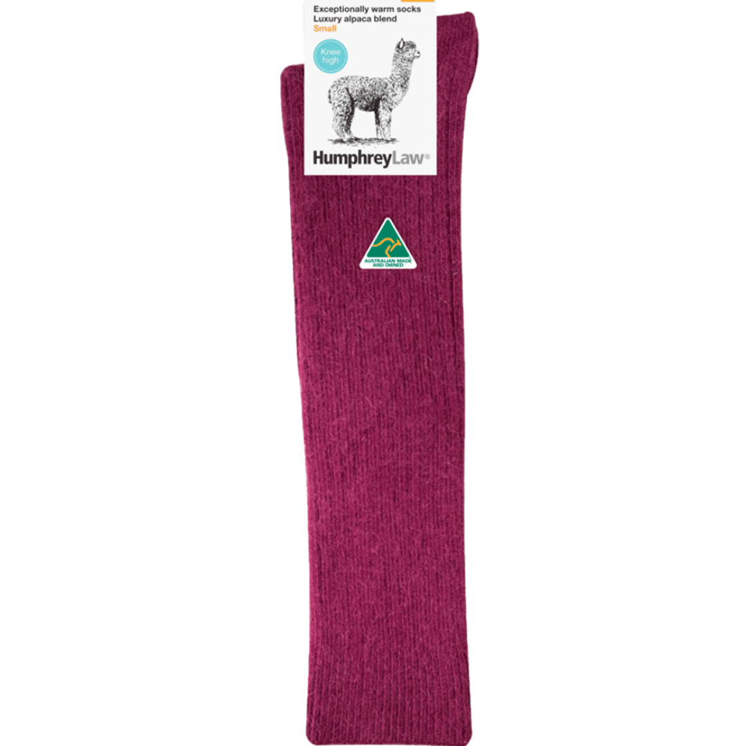 Stewarts Menswear Humphrey Law Australian made alpaca/wool blend knee-hi socks. An exceptionally warm luxury knee-high sock made with a blend of alpaca and wool. Alpaca fibre is soft, supple and smooth and contains microscopic air pockets which act as insulators keeping in the warmth provided by the wool.  Please note as alpaca is a luxury fibre these socks are not recommended for high abrasion use such as work boots. Colour is Berry, a rich crimson colour.