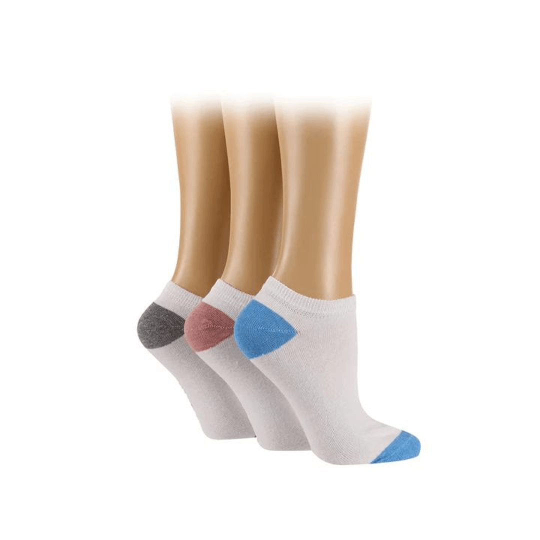 Stewart's Menswear TORE recycled socks. Ladies plain trainer liner socks. Three pairs of white socks, each with a different colour heel/toe (grey/pink/blue). The world's first range of socks that are 100% certified as totally recycled. All materials used in the manufacturing process are sourced from existing resources on our planet.  Even the packaging is recycled and printed using plant based inks! TORE® is committed to the belief that "your socks shouldn't cost the earth". 