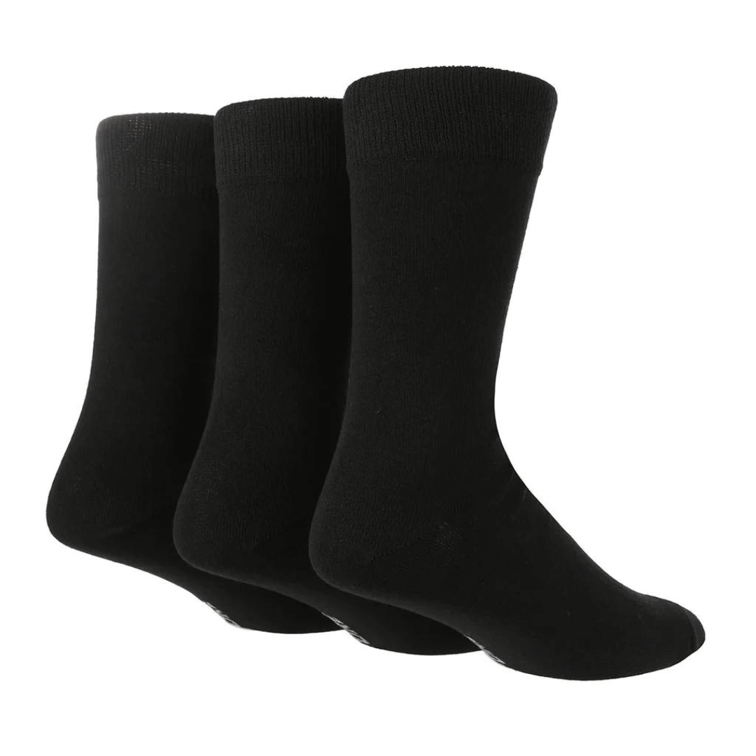 Stewart's Menswear TORE recycled socks. Men's plain crew socks. Three pairs of black socks. The world's first range of socks that are 100% certified as totally recycled. All materials used in the manufacturing process are sourced from existing resources on our planet.  Even the packaging is recycled and printed using plant based inks! TORE® is committed to the belief that "your socks shouldn't cost the earth". 