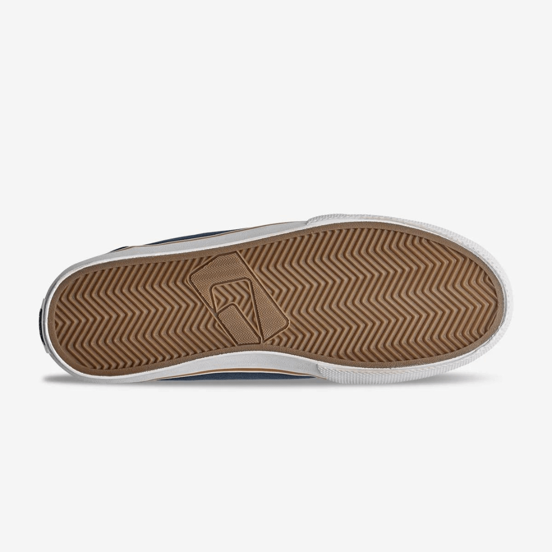 The Globe GS in Midnight is a vegan friendly skate shoe with a recycled PU/Canvas upper. A simple classic shoe featuring Globe's Shockbed insole for all day comfort, minimal padding and vulcanized construction for board feel and grip. Image is bottom of show showing herringbone outsole.