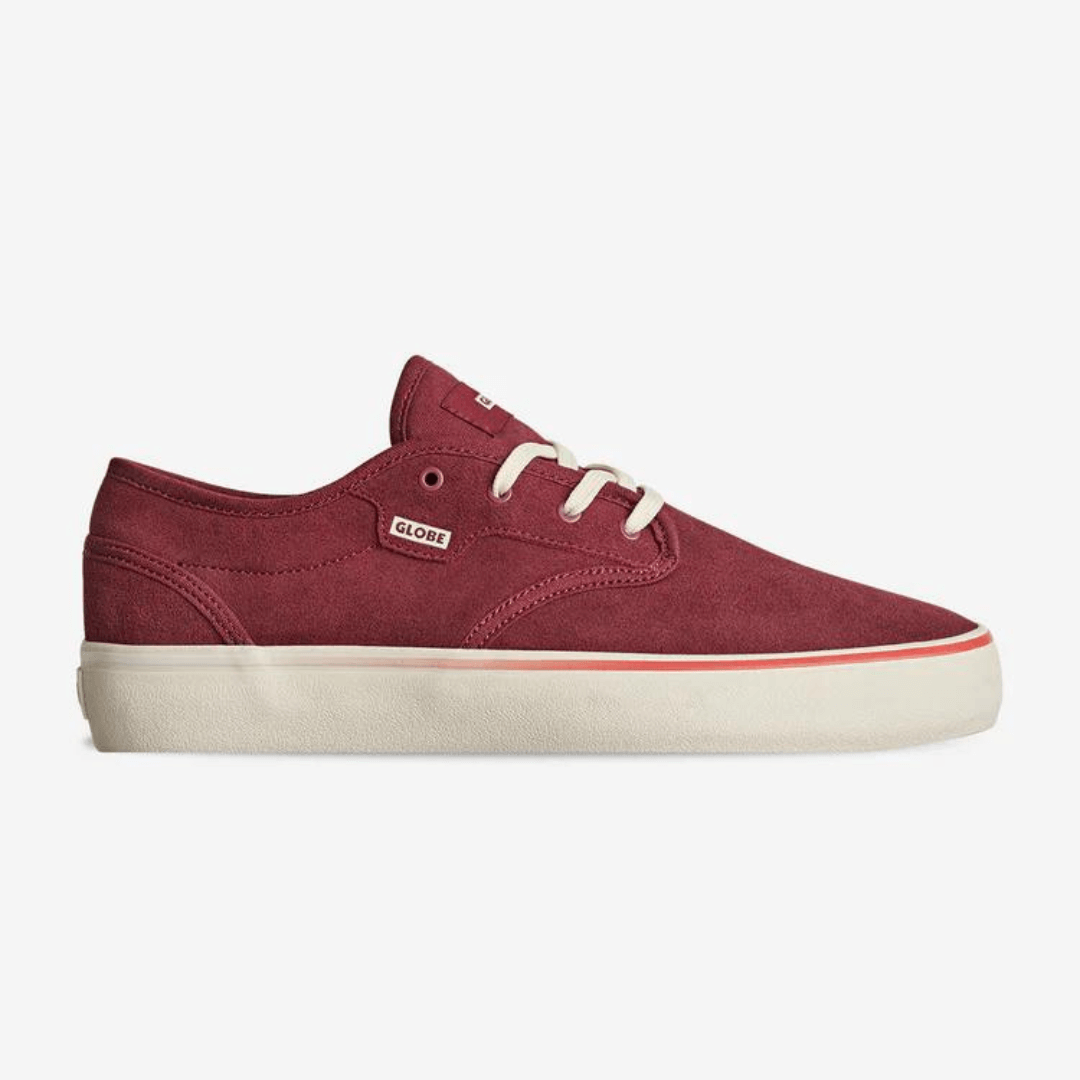 Stewart's Menswear Globe Motley II skate shoe in Port/Antique features a refined shape for improved fit and feel while maintaining all the features of the original skate classic.  It's suede/canvas upper is colour Port, a rich maroon colour with an antique white (off white colour) sole. Side view