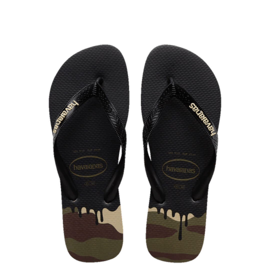 Shake up your Summer look with these new season thongs. Havaiana Top Ink print are the latest to hit stores this month. These black thongs have a black strap with sand coloured raised rubber logo. The black foot bed turns into a dripping ink look over a camo coloured heel.