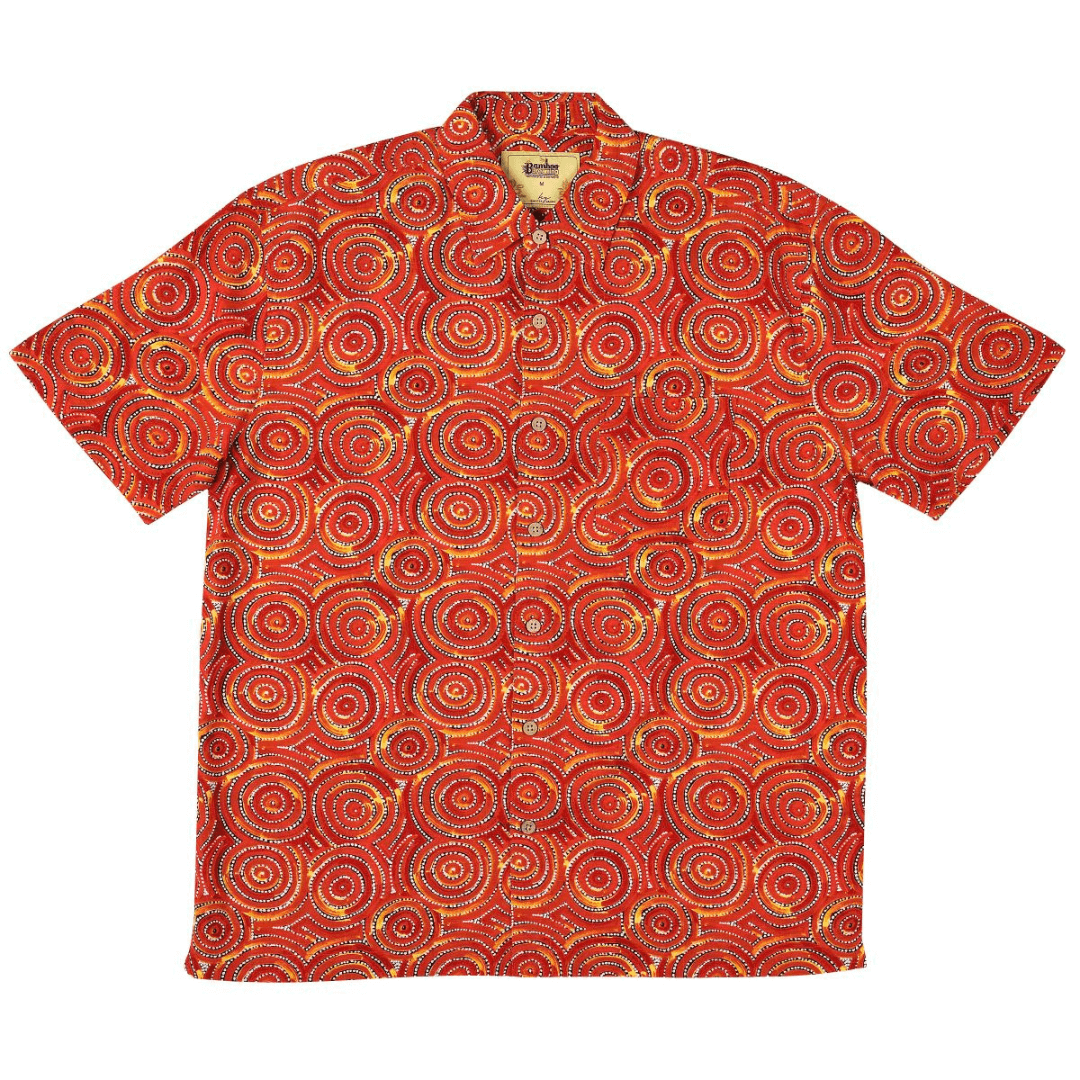 Stewart's Menswear Kingston Grange Bamboo Dreaming men's short sleeve shirt - Jukurrpa Mina Mina. Bamboo clothing is perfect to wear in our climate and it’s better for the planet too! Bamboo clothing feels soft and silky, a very luxurious fabric which is comfortable to wear. It’s anti static so it sits on the body nicely without clinging. It is also hypoallergenic, breathable and absorbent. This men's bamboo shirt named Jukurrpa Mina Mina has an aboriginal circular print in orange and yellow colours.