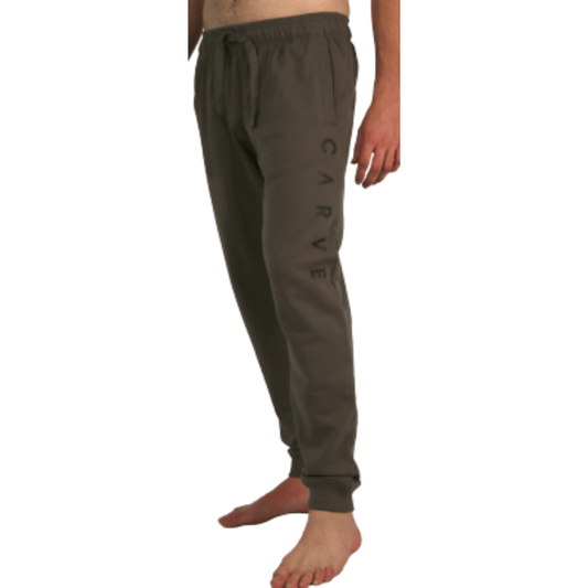 The Swag track pant by Carve surf brand is made from a 280gram cotton polyester blend and has an elastic waist with straight ankle design.  You can easily store your essentials like keys, phone, or wallet in both the front welt and back pockets. Tonal embroidery on the left leg finishes of these classic regular fit trackies. Colourway is Shitake