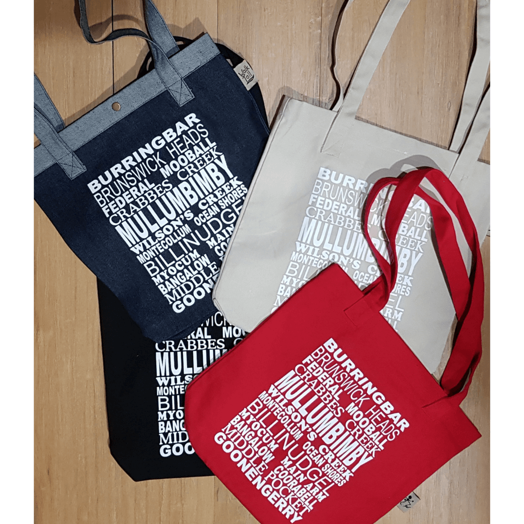 Stewarts Menswear Mullumbimby. Souvenir Tote bag. A photo showing all four colours available: red, natural, black and denim