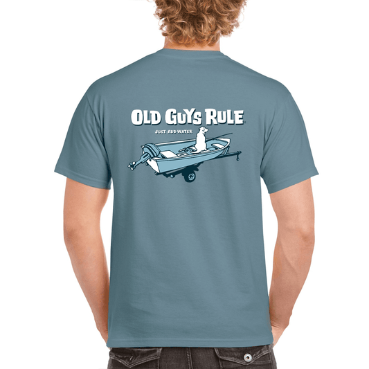 A stone blue 100% cotton men's T-shirt with novelty print. "Just Add Water". Print is a dog and a fishing rod in a boat. Old Guys Rule men's novelty print Tee shirt.
