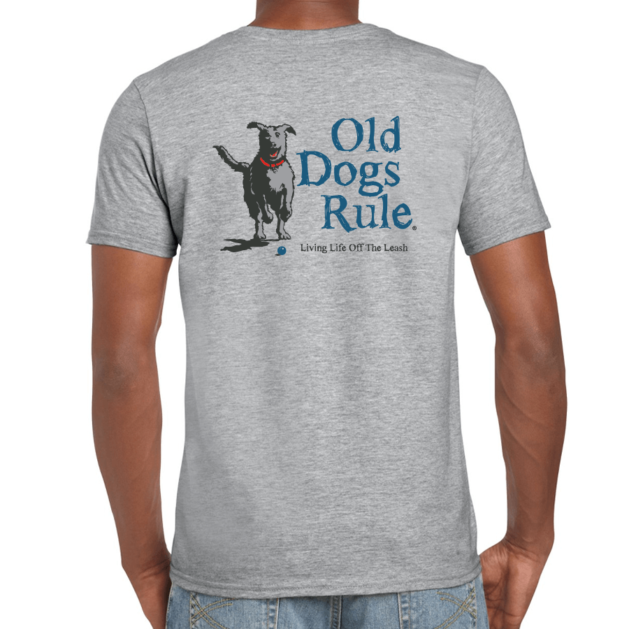 A grey marle 100% cotton men's T-shirt with novelty print. "Old Dogs Rule. Living life off the leash."Print is a dog running free. Old Guys Rule men's novelty print Tee shirt.