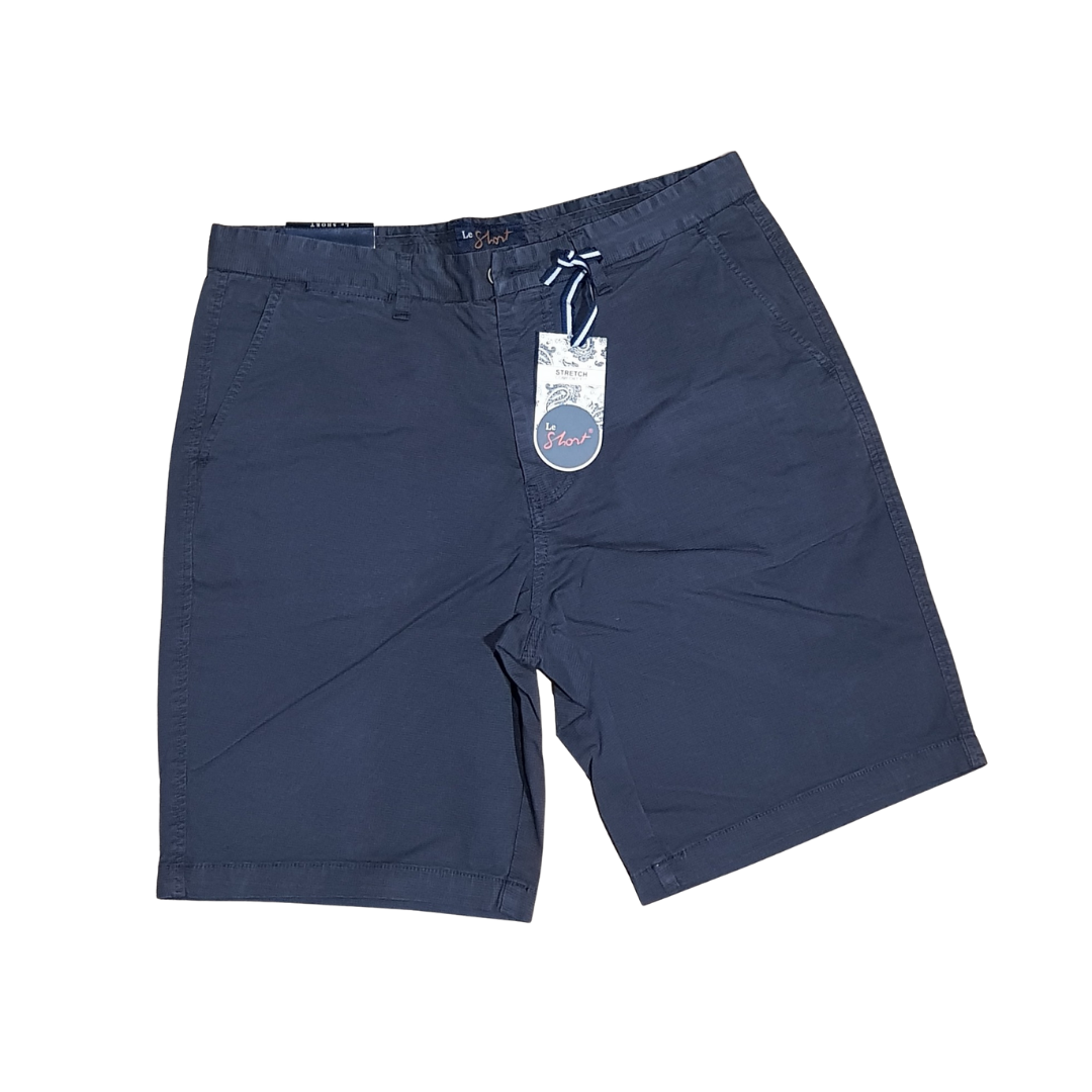 Stewarts Menswear Le Short stretch cotton shorts.  Made with a blend of 97% cotton and 3% spandex, they offer a comfortable and flexible fit that moves with you throughout the day.   These shorts come in a range of classic colours, making them easy to pair with your favourite summer shirts, and with a range of sizes available, there is a perfect fit for every body type.  It is hard to see in the images, these shorts feature a tiny all over check print on the fabric. Colour is Carbon, front view.