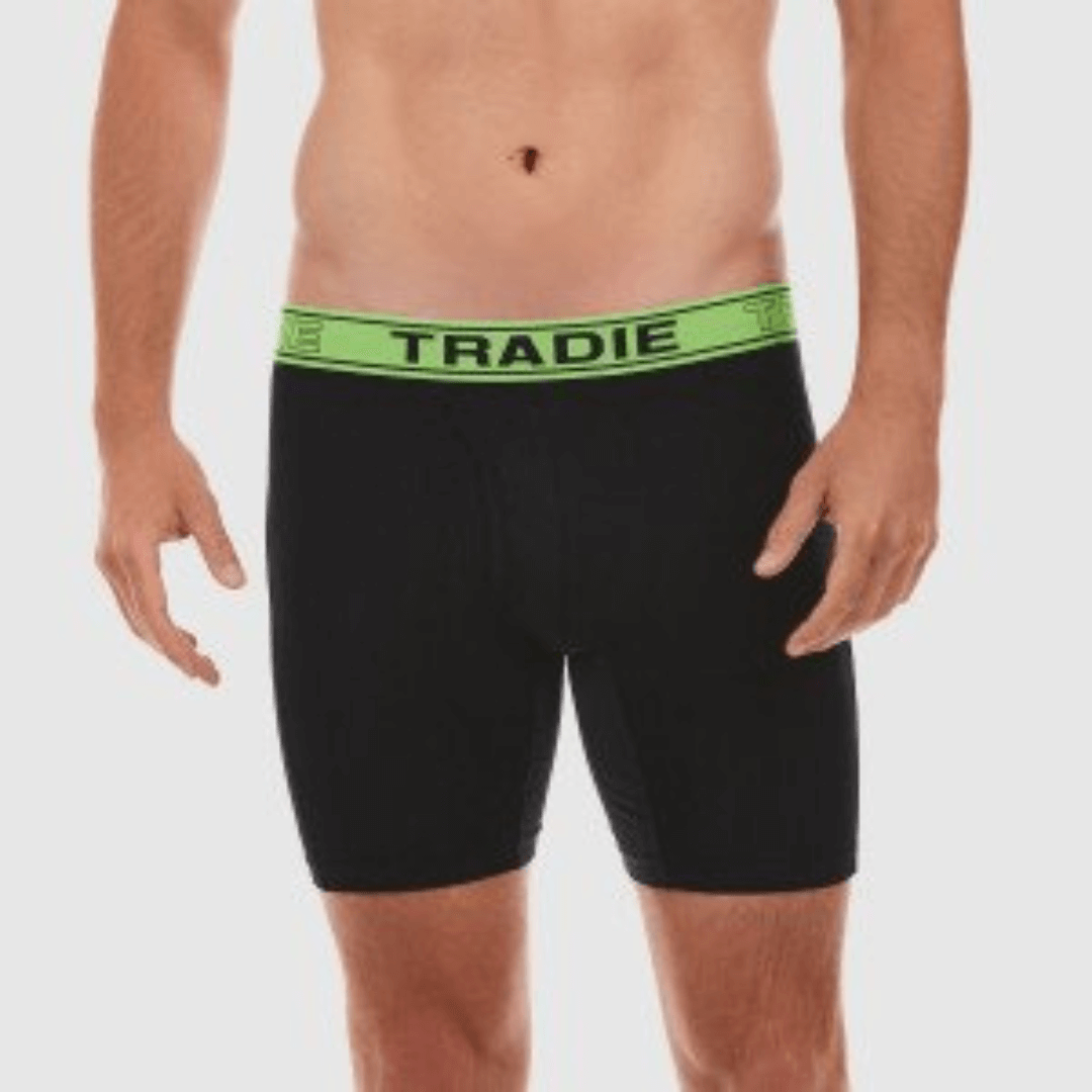 Stewart's Menswear Tradie No Chafe Bamboo long leg trunk.  The unique No Chafe nylon/elastane inner leg panels ensure that chafing is minimized, although  chafing may still occur.  The undies feature a long leg trunk design that prevents ride up and the bamboo fabric is super soft and breathable. Base colour is Black. Lime Green waistband with black Tradie brand. Photo of model wearing underwear.