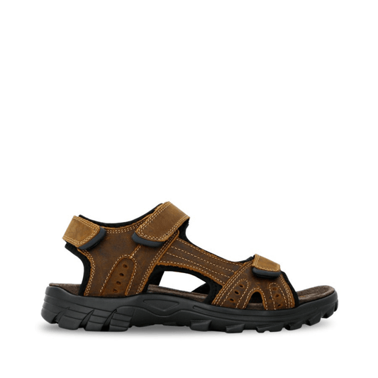 Stewart's Menswear Enrique sandals by Woodlands are the perfect everyday leather sandals for men. With adjustable straps, they fit any foot.    Features a leather upper and synthetic lining plus the padded insole will keep your feet feeling comfortable all day long. Side View