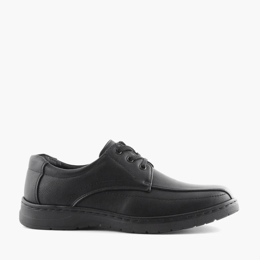 Stewart's Menswear Woodlansd Luai Men's lace up shoe. Luai by Woodlands is a men's lace-up shoe which features patterned stitching and a cushioned collar with a durable rubber outsole.  Man-made upper, lining and sole.  Side View, Colour is black.